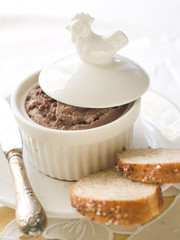 Chicken liver pate in ramekin, selective focus