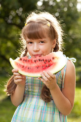 Funny little girl with pigtails