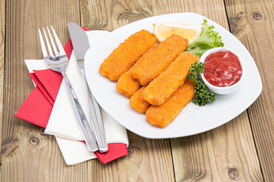 Portion of Fish Fingers on a plate