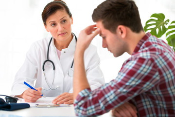 doctor with male patient