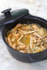 Scampi with potatoes and spices