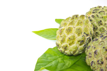 Custard apple  and leaves on white background