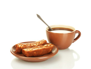A cup of tea and saucer with delicious sherbet isolated on