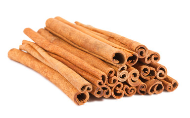 Cinnamon sticks on a white background