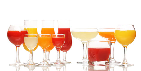Tropical juices in glasses isolated on white