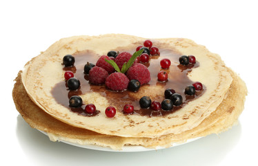 Delicious pancakes with berries and chocolate