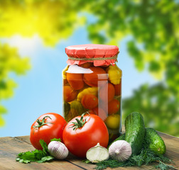 canned vegetables and fresh against the backdrop of nature