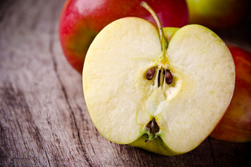 Red apples on wooden table