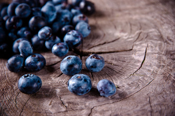 Fresh blueberries on wooden background