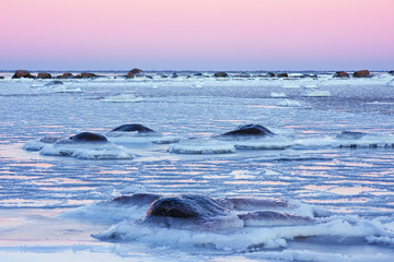 Frosty and icy sea at sunrise