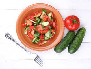 Fresh salad with tomatoes and cucumbers
