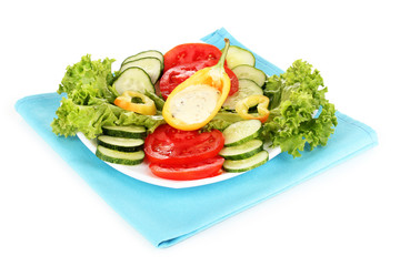 Chopped vegetables and sauce on plate isolated on white