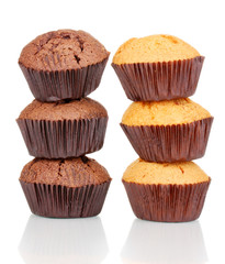 Fresh muffins isolated on white