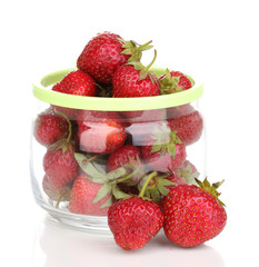 Sweet ripe strawberries in jar isolated on white