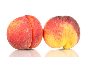 ripe peaches isolated on white.