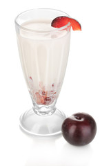 Delicious milk shake with fruit isolated on white