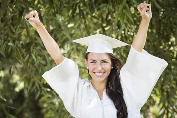 Happy Graduating Mixed Race Girl In Cap and Gown