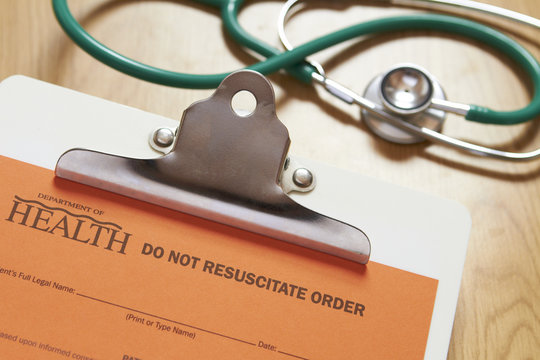 Do Not Resucitate Order On Clipboard With Stethoscope In Backgro