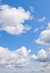 White clouds over blue sky. Nature background.