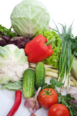 Fresh vegetables on white.