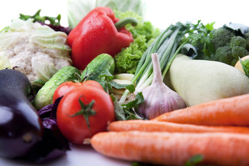 Fresh vegetables on white.