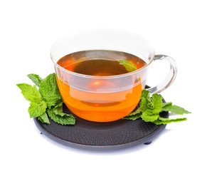 tea cup with meant isolated on white background