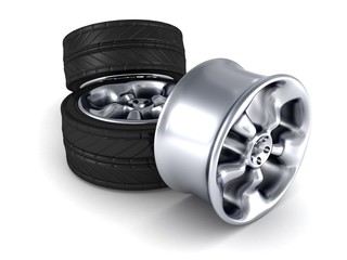 car wheels and one alloy wheel on white background