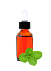 bottle with essence oil and mint herb isolated on white