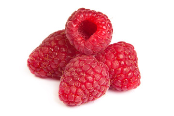 Group of some raspberries on a white background. Close up macro
