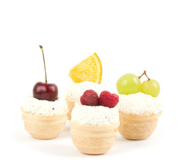 Tasty fruit cakes on the white background