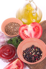 red tomatoes, olive oil and spaces for preparation of sauce