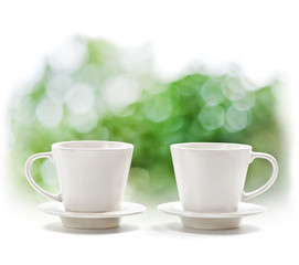 Cups on defocus summer background