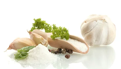 Foto auf Glas salt with fresh basiland parsley, garlic and pepper isolated © Africa Studio