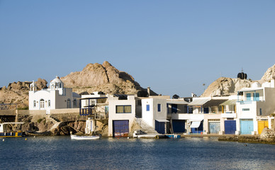 fisherman houses built into rock cliffs  Mediterranean Sea Firop