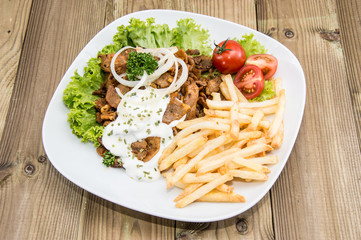 Chips, Kebab meat and Sauce