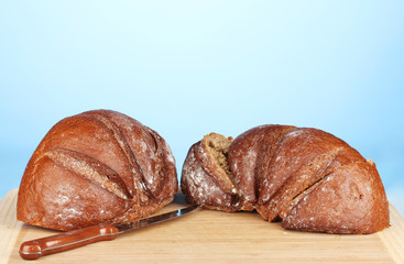 sliced bread on blue background close-up