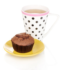 Fresh muffin with tea isolated on white