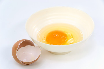 egg yolk in a  bowl for cooking and egg shell
