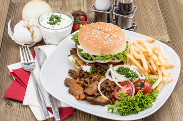 Kebab Burger with Chips on wood