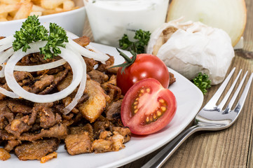 Kebab meat with Onions on a plate