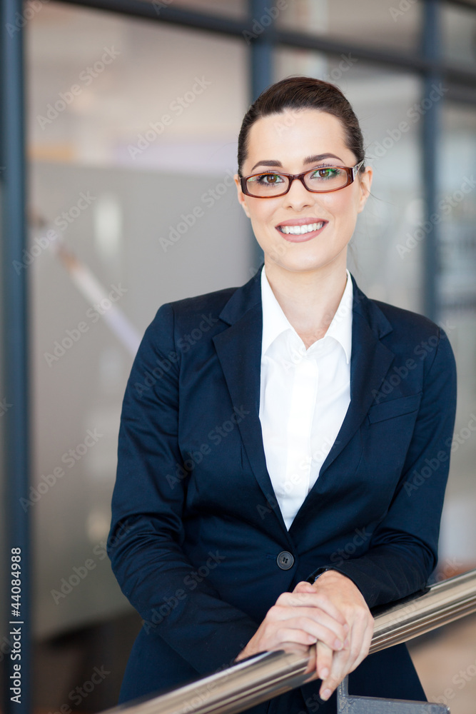 Wall mural beautiful young businesswoman portrait in office