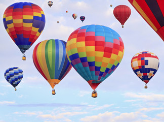 Obraz premium Multicolored hot air balloons flying
