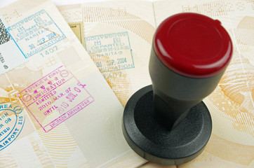 passport pages and rubber stamp