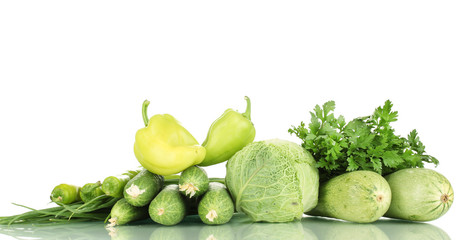 fresh green vegetables isolated on white