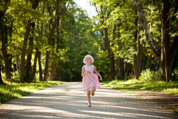 Fototapeta premium Little girl runs