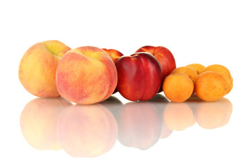 Ripe nectarines, apricots and peaches isolated on white
