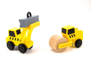 Set of Yellow Toy Construction Vehicles.