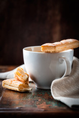Cup of coffee with french pastries