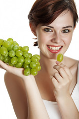 young girl eating a grape wine