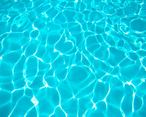 clear blue water in swimming pool - Powered by Adobe